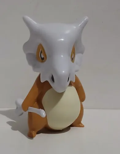 BONECO ACTION FIGURE MINIATURA POKEMON CUBONE OCO POR DENTRO