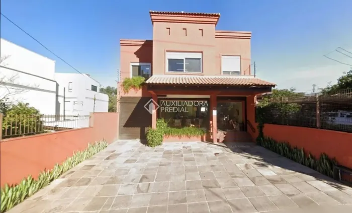 Prédio comercial com 200m² à venda no Bairro Cristo Redentor a meia quadra da Estrada do F