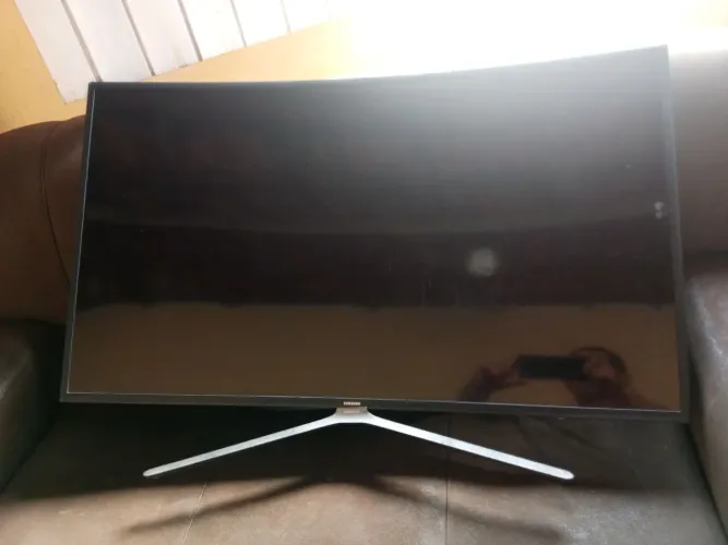TV SAMSUNG 49 COM DEFEITO.