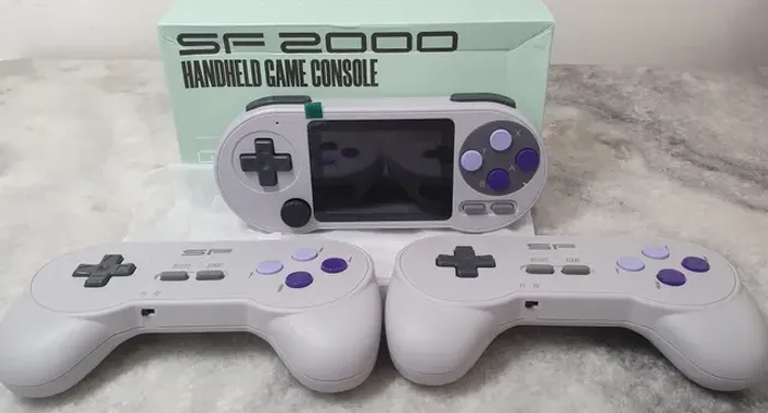 Console portátil 2 em 1 data frog com dois controles e vários jogos