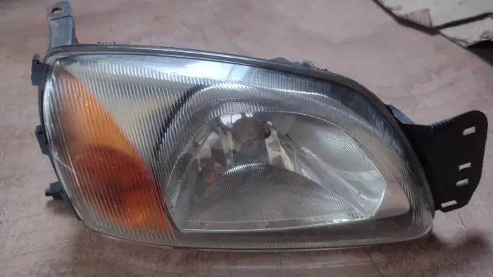 Farol Ford Courier e Fiesta LD