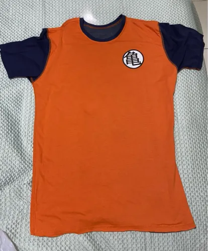Camiseta  nova Goku - Dragon Ball Z dupla face TAM gg