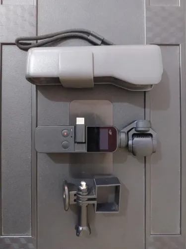 DJI Osmo Pocket 4K + Case + Adaptadores Lightning e USB-C + Suporte para Tripé