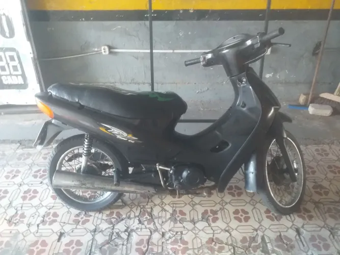 Biz 100Cc ano 2010 côr preto. Mandei fibrar e pintar  