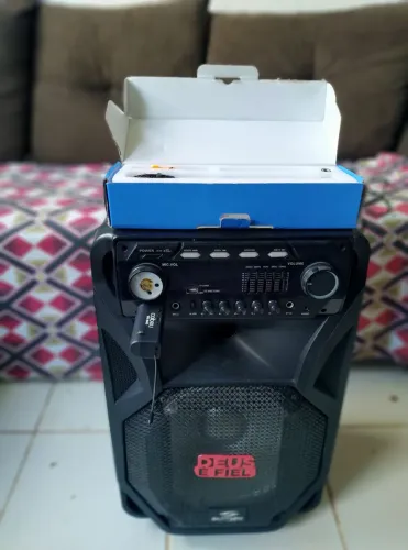 Vendo uma caixa de som potente com microfone,ou troco em uma bicicleta