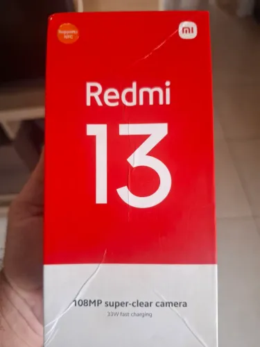 Celular semi novo Redmi..13