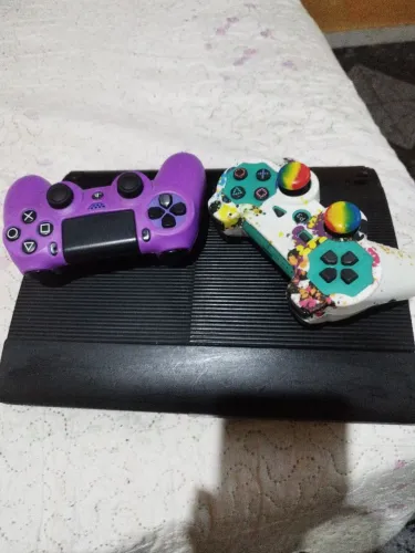 Troco meu ps3 com 2 controle e vários jogos
