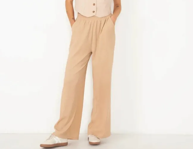 Calça texturizada bege