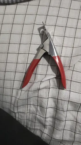 Cortador para longamento de unha