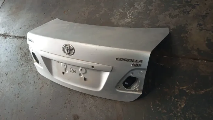 Tampa traseira corolla 2010