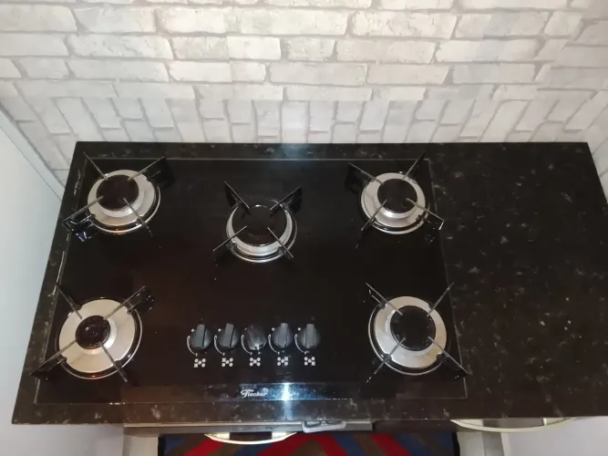 Fogão cooktop 5 bocas marca Fischer em perfeito estado, apenas com algumas marcas de uso