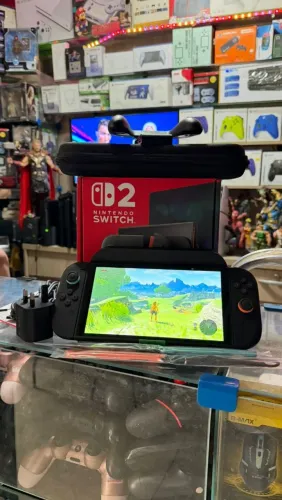 switch 2 impecável menos 1 mês d uso completo na cx ac trocas....