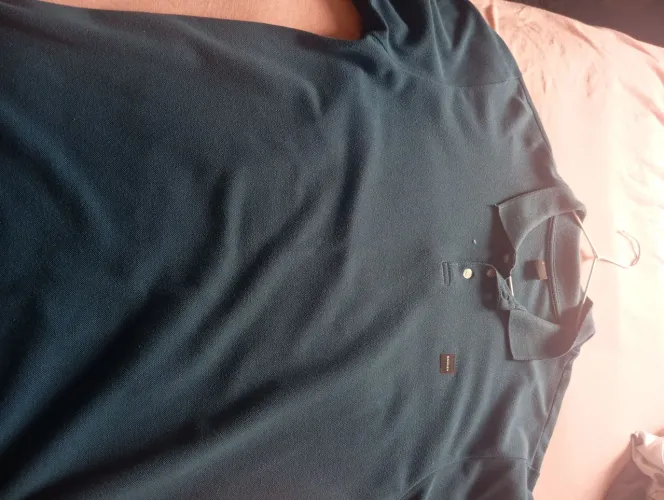 vendo camisa da oakley cor verde original ganhei de presente usada 1 vez tamango g