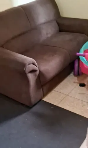 Sofá com capa inclusa