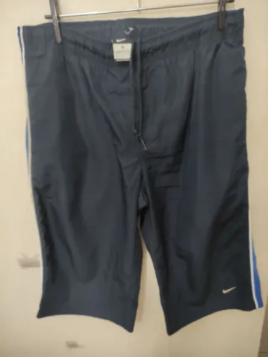 NIKE BERMUDA MASCULINA TAM M 85,00<br>
