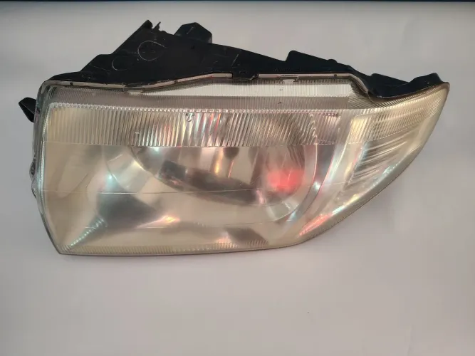 Farol Pajero TR4 lado esquerdo ano 2004 A 2006 cromado 