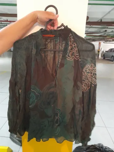 Blusa de grife