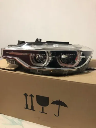 Farol dianteiro original BMW