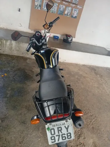 Troco em caro moto yamara muito conservada segundo dono aro liga leve freio a disco pneus
