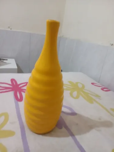 Vende se um Jarro de Flores novo Valor 70 reais número de zap * e *