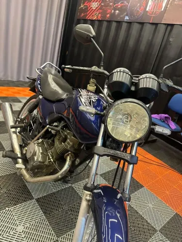 CG TITAN 125 CARBURADA ?