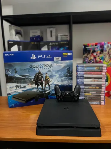 PS4 slim com 2 controles, caixa e jogos em excelente estado!
