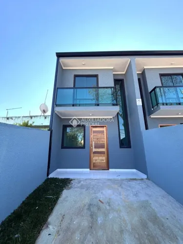 Sobrado no bairro Tatuquara na cidade de Curitiba/PR à venda com 82m².