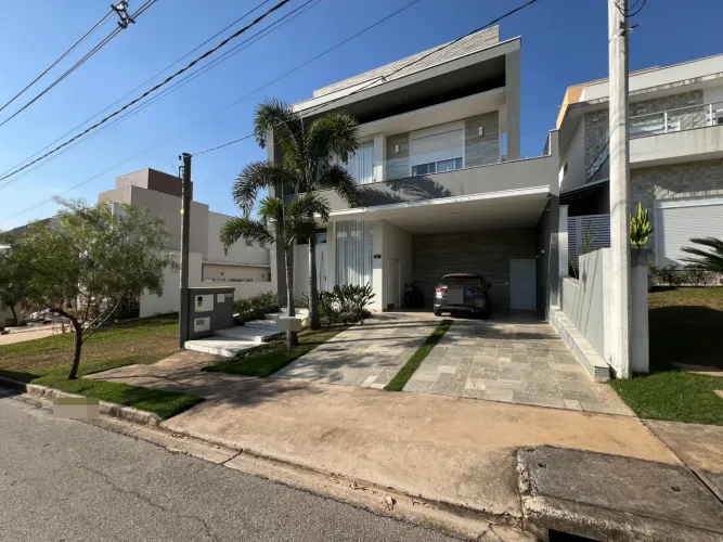 Luxuosa Casa com 3 Suítes, Piscina e Placas Fotovoltaicas no Condomínio Completo Ibiti Res