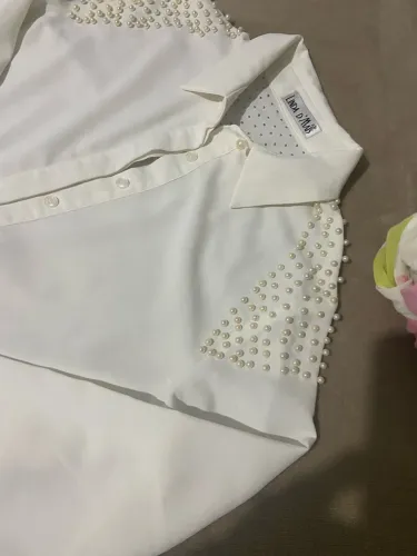 Camisa