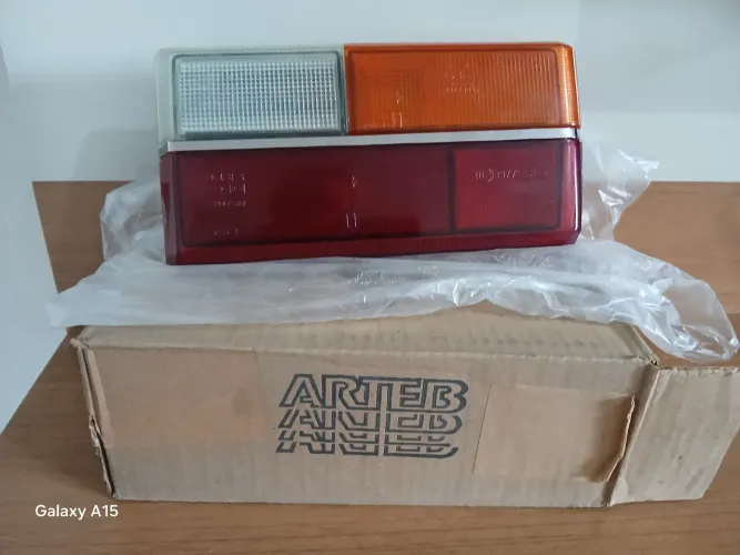 Lanterna traseira gol gt bx arteb com logo volks