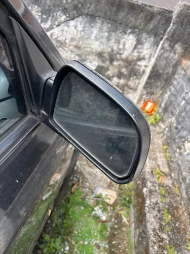 Retrovisor Tucson direito R$.  250