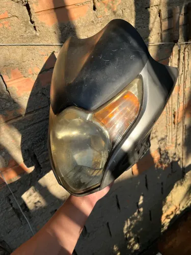Frente farol titan 150