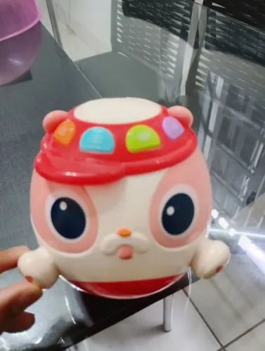 Brinquedo giratório (emite sons também)para bebês