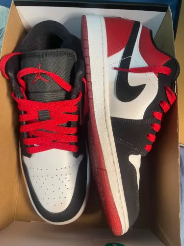 Tênis Air jordan 1 low Black toe 2023