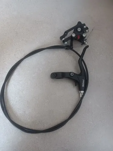 Vendo freio traseiro Absolut a disco para bicicleta aro 26 com menos de 1 mês de uso