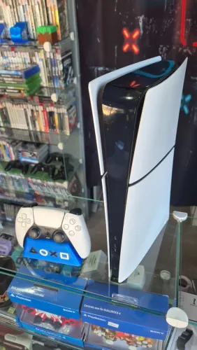 PS5 Slim, Seminovo, Garantia, aceito seu usado de entrada e cartoes ate 18x