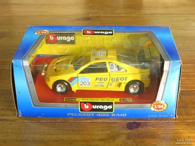 Miniatura Peugeot 405 Raid 1:24 amarelo rallye Burago na caixa (Hobby Diecast)