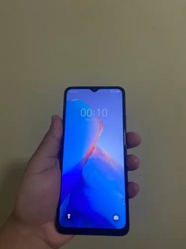 Smartphone Infinix Smart 7 64GB - Estado de Novo (Com Capa)