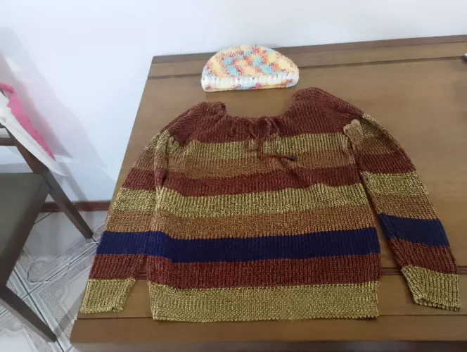 Malha de tricô e gorro