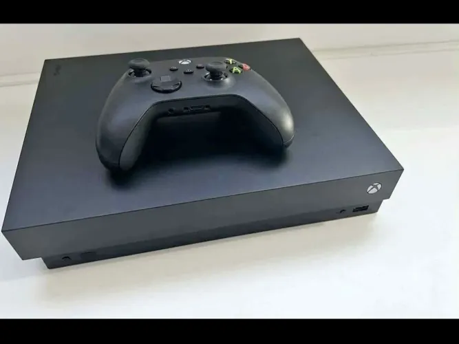 Xbox One X, semi novo, muito bem conservado. Parcelo. Vendo ou troco. Leia a descrição.