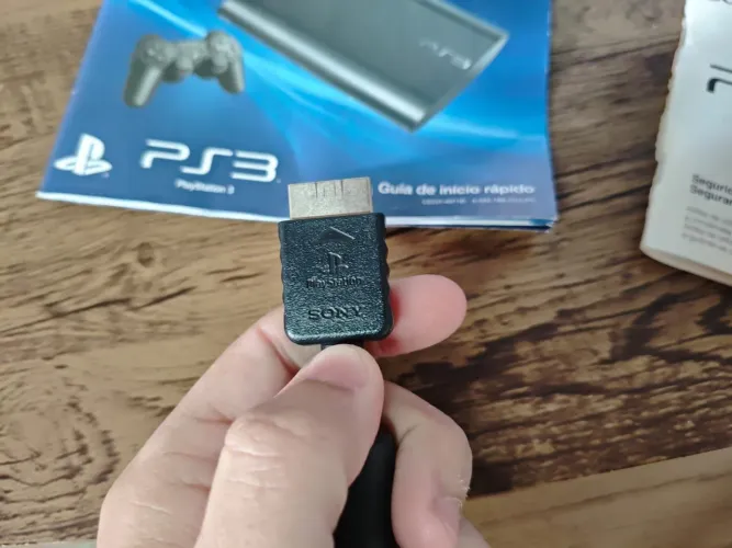Caixa e acessórios PS3