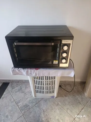 Forno em perfeito estado e funcionando tudo