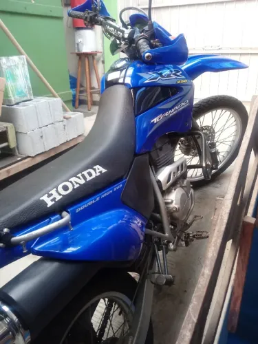 Vendo Honda Tornado 250 azul ano 2005