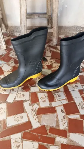 Capa de chuva e bota
