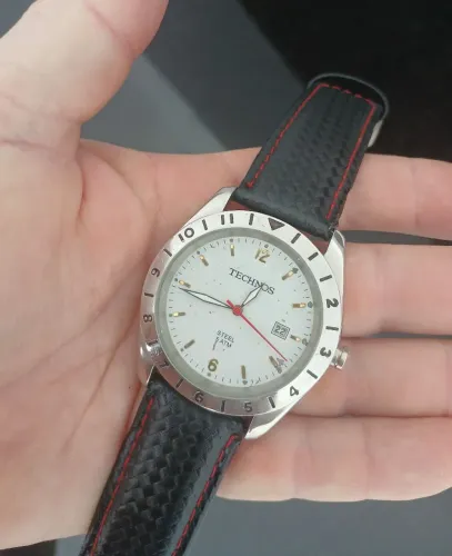 Relógio antigo TECHNOS STEEL social clássico quartz seminovo, estudo trocas.