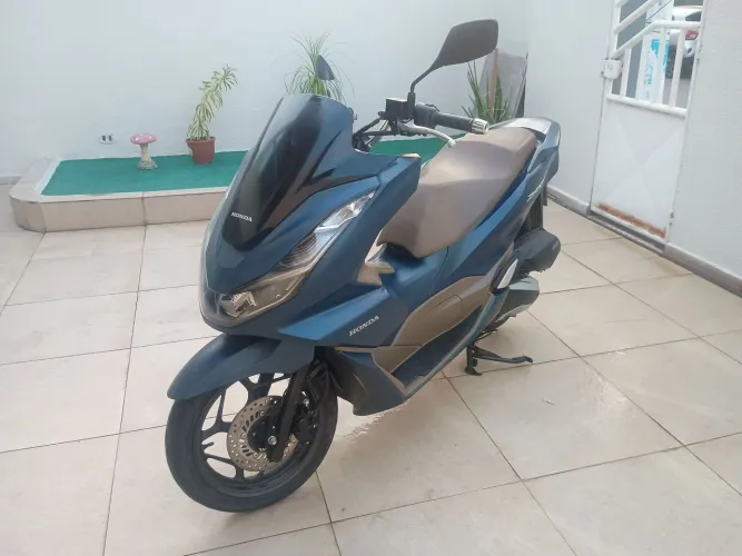 Moto em perfeito estado de conservação