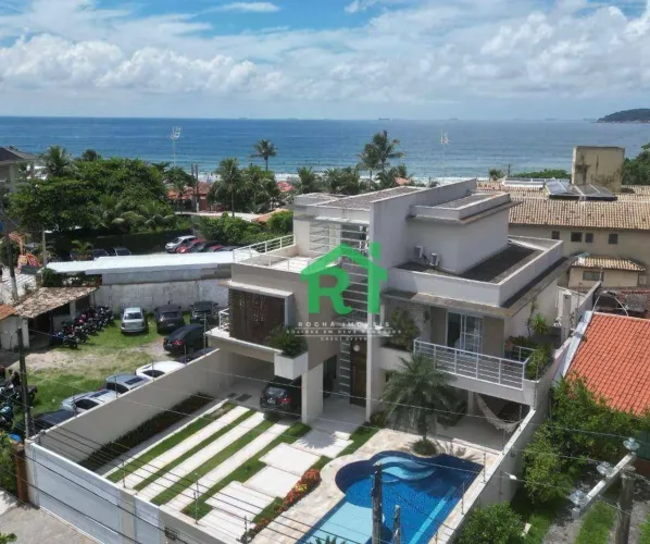 Casa à beira mar com 5 quartos (5 suítes), 6 vagas e lazer à venda em Tombo, Guarujá