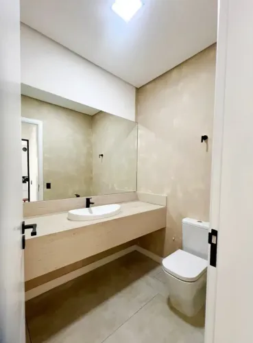 Residência Contemporânea com 4 Suítes no Tamboré 10