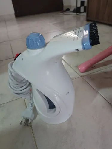 Passadeira a vapor portátil Lenoxx com defeito