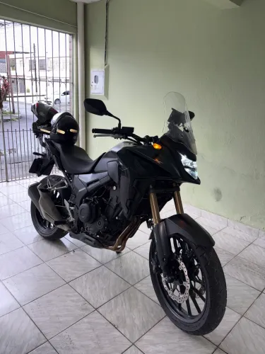 Vende se cb500x nova de verdade troco em carro é moto !